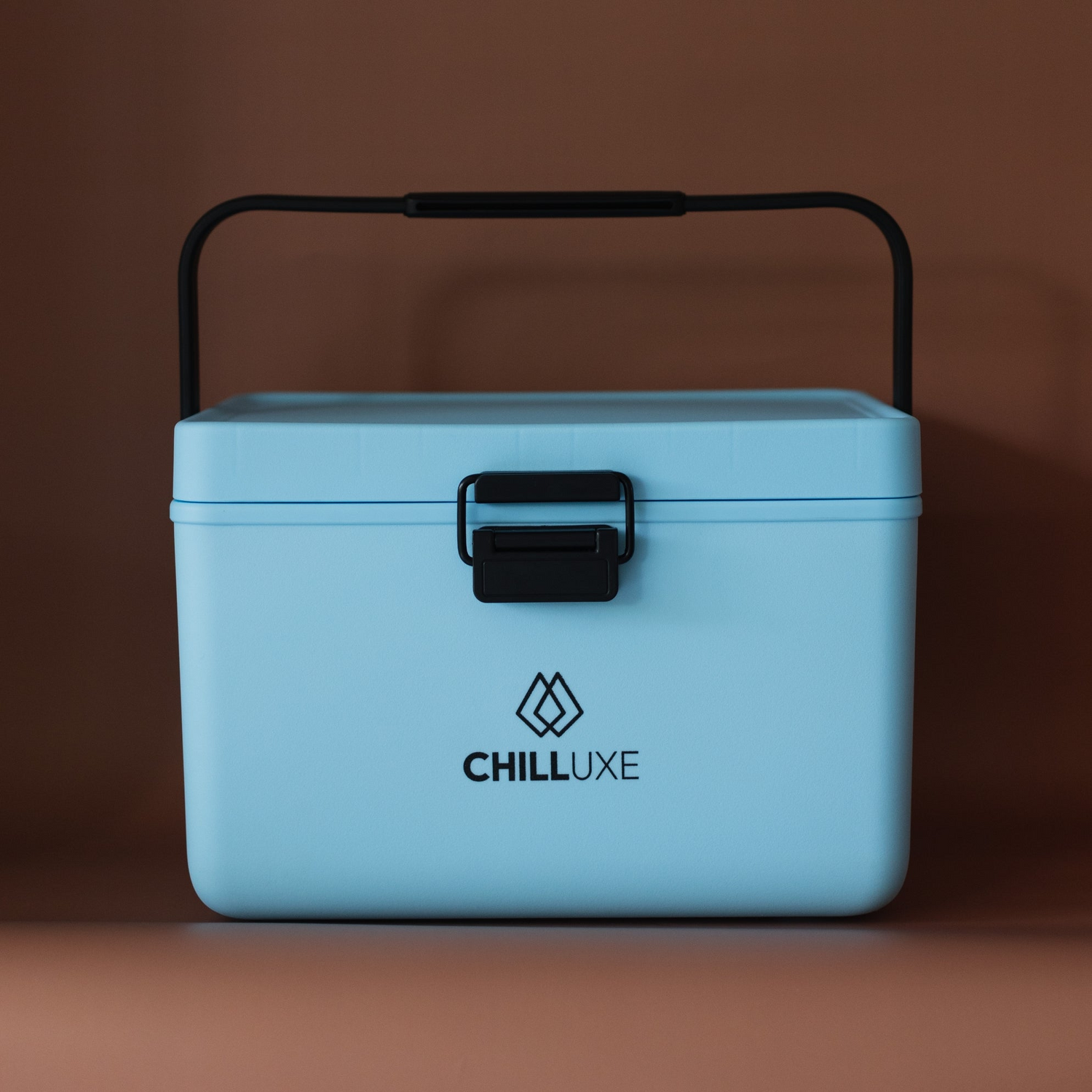 Chilluxe Blue Cooler Box - Featuring a Sturdy Latch, Portable Handle, and Spacious Compartments, Perfect for Keeping Drinks Cold and School Lunches Fresh, with a Design Built to Withstand Outdoor Adventures and Monkey Interference.